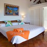 bedroom of the tradition garden cottage at le village st barts hotels